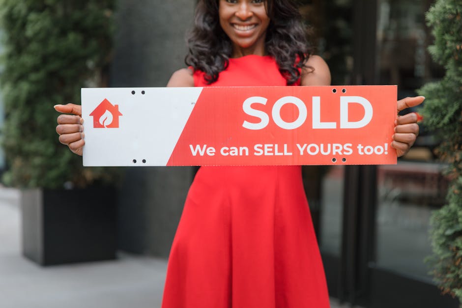 Professional real estate consultant in front of sold property